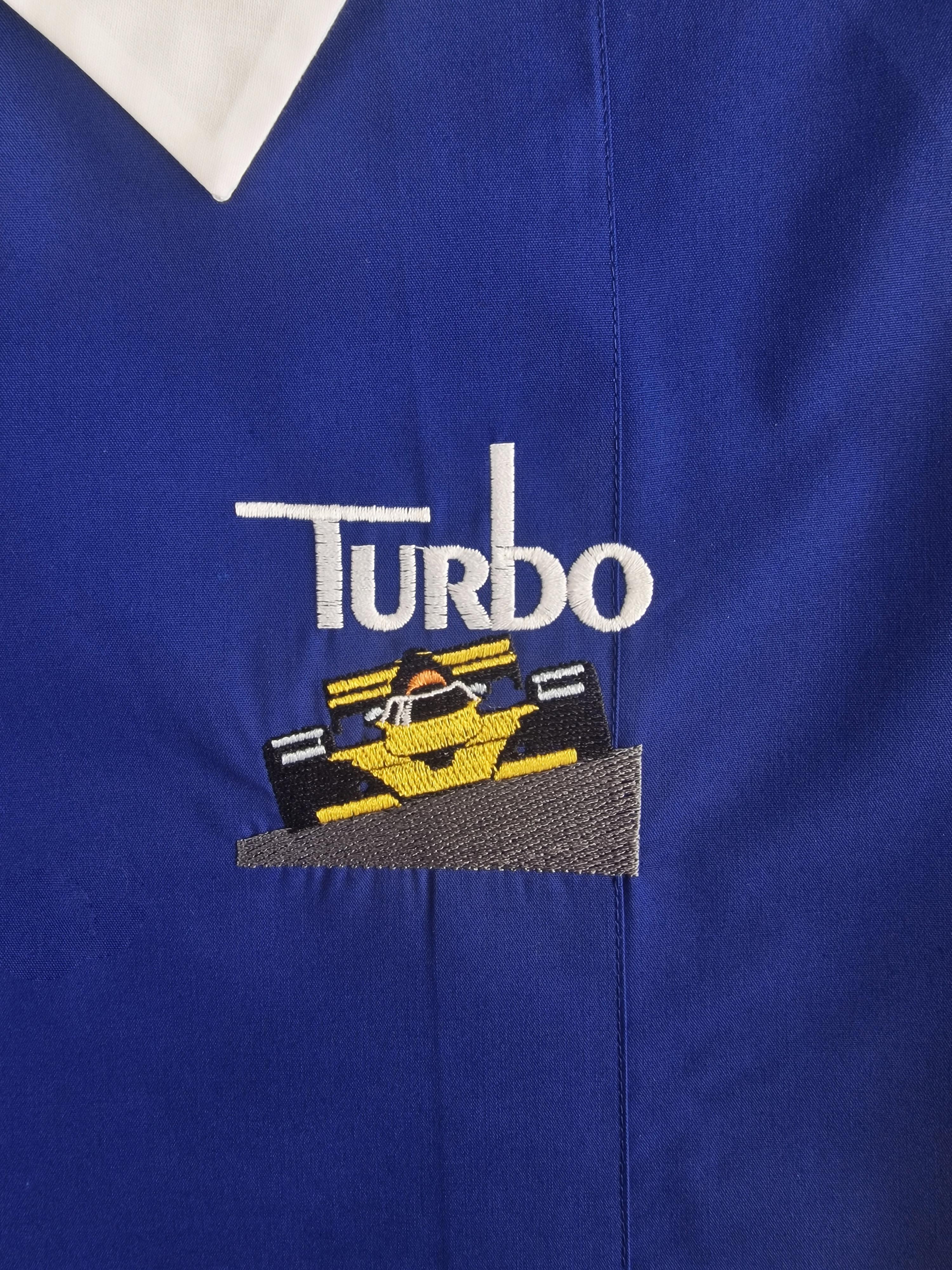 Grembiule scuola elementare da bambino blu zip Siggi macchina da corsa