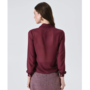 Blusa con fiocco e dettagli gold